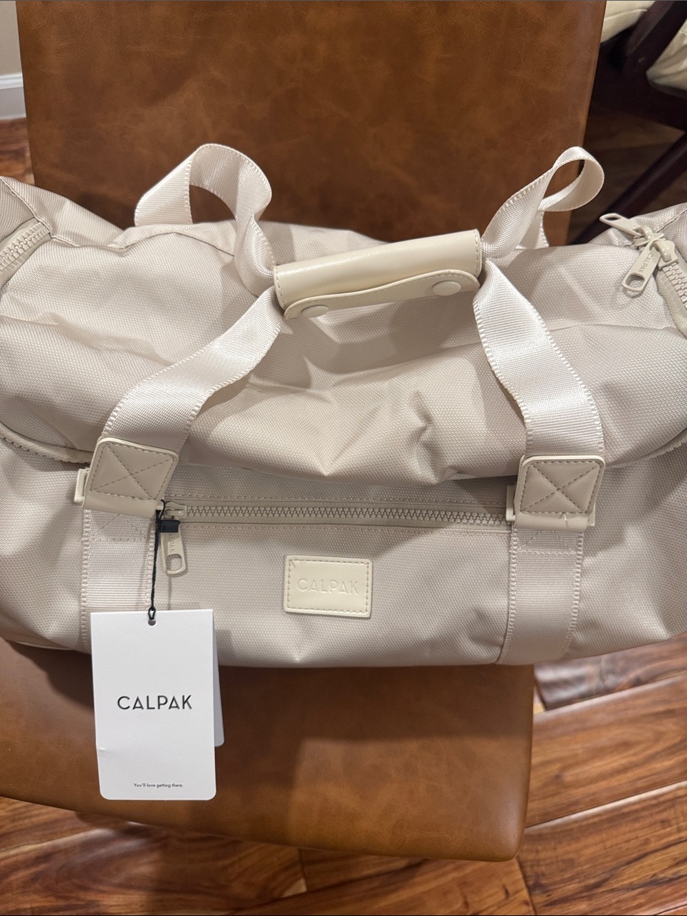 Calpak Cream Duffel with Front Zip Pocket